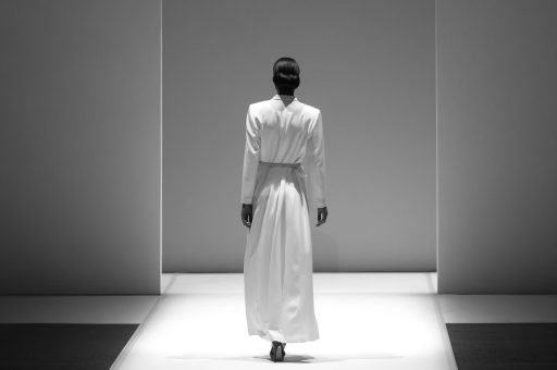 Model walking a catwalk during a fashion show